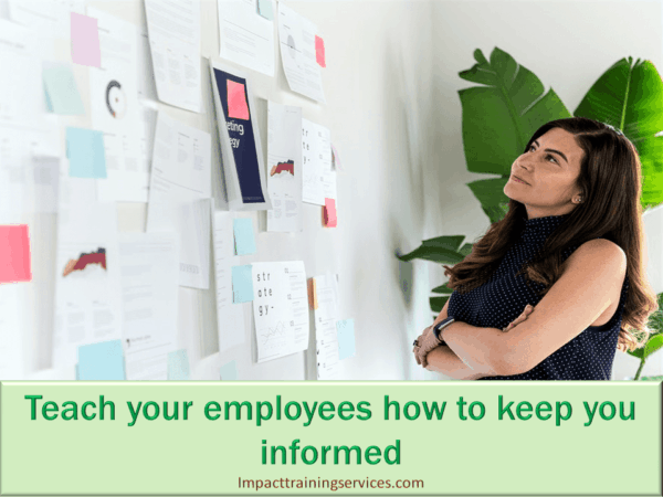 image showing female owner showing employees how to keep her informed and reduce employee turnover