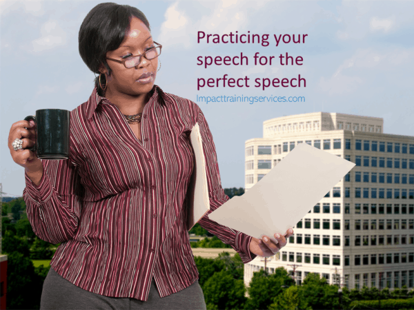 Cover image for practicing your speech showing a businesswoman practicing her speech