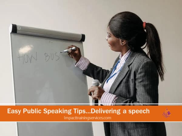 image of small businesswoman using easy public speaking tips to deliver speech